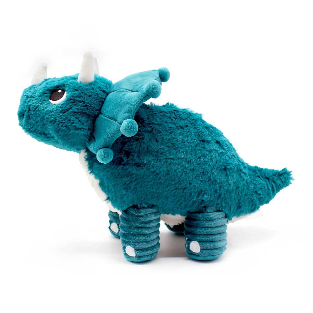 Seitenansicht des türkisblauen Triceratops-Kuscheltieres mit flauschigem Körper und gerippten Beinen
