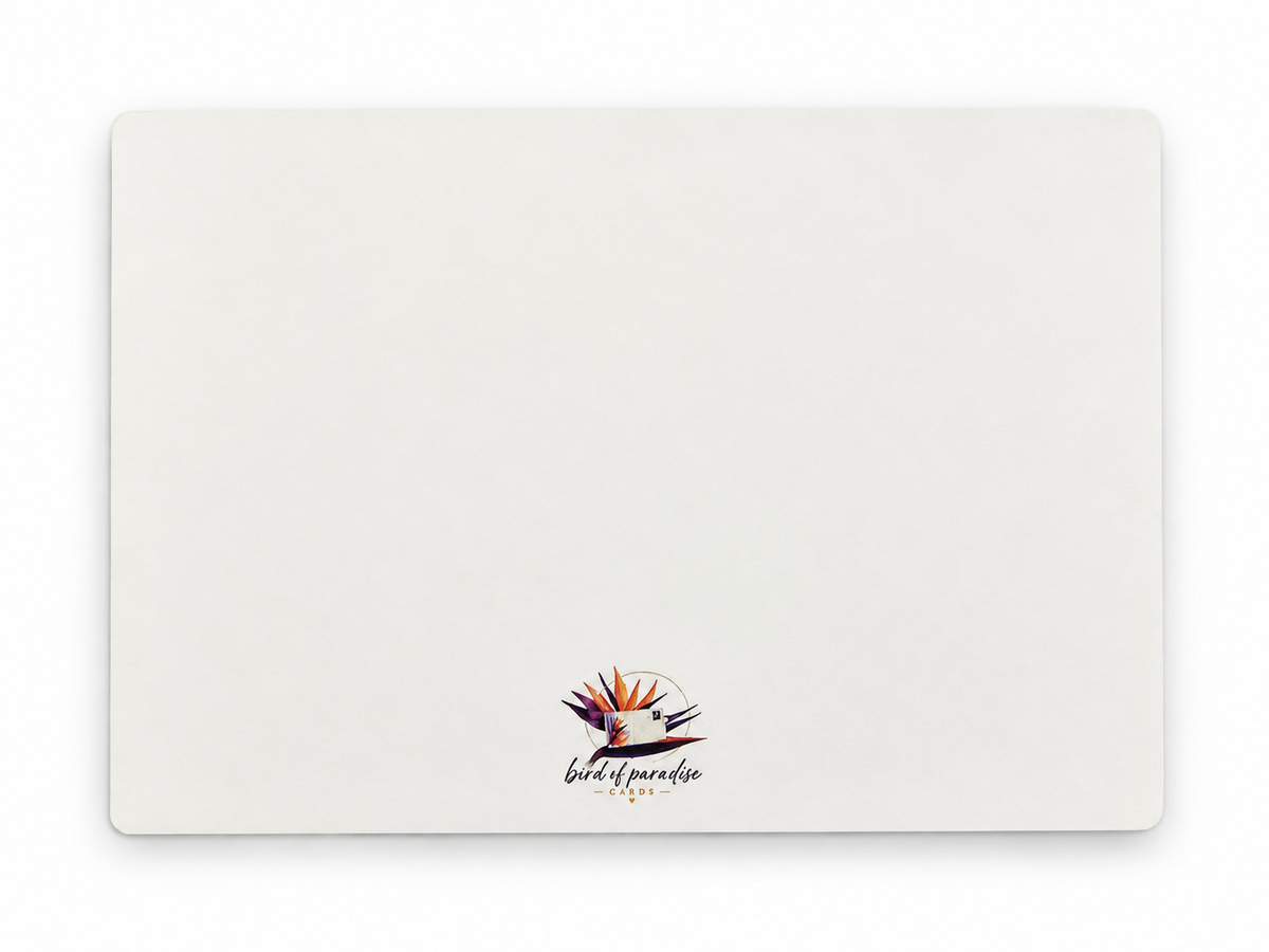 Weiße Rückseite einer DIN-A6-Postkarte mit Bird of Paradise Cards Logo