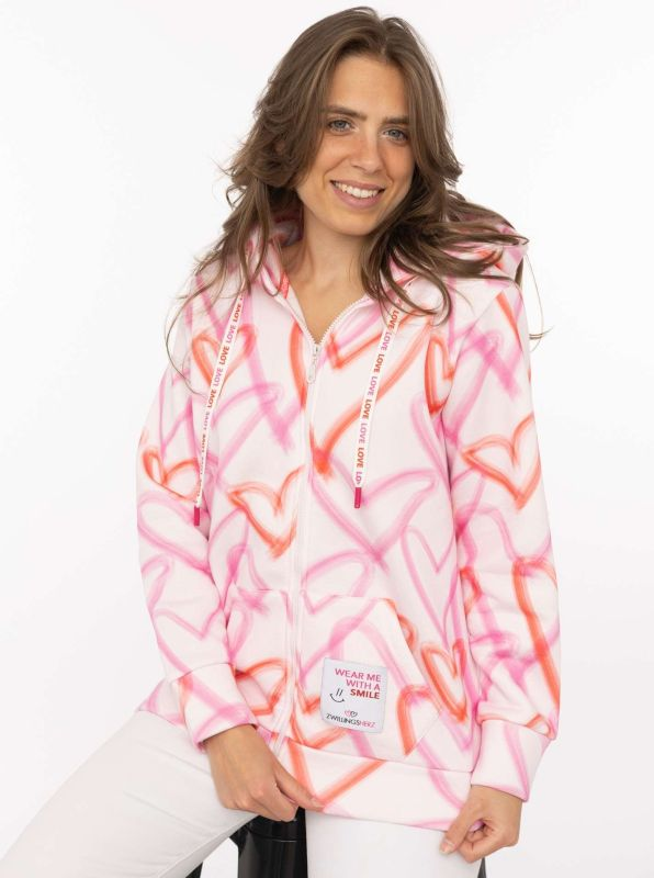 Hoodie-Jacke Big Hearts Zwillingsherz – Frontansicht getragen, Herz-Print Pink & Orange