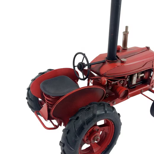 Roter Metall-Traktor der FORMANO Tischleuchte von hinten mit Lenkrad, Sitz und großem Hinterrad