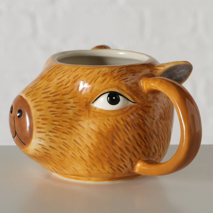 Capybara Becher – Seitenansicht mit Auge und Henkel