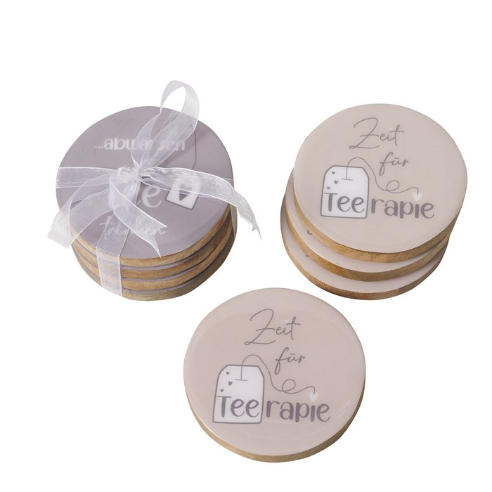 Untersetzer Tee 4-tlg. – Set mit Schleife verpackt und einzelne Untersetzer auf weißem Hintergrund